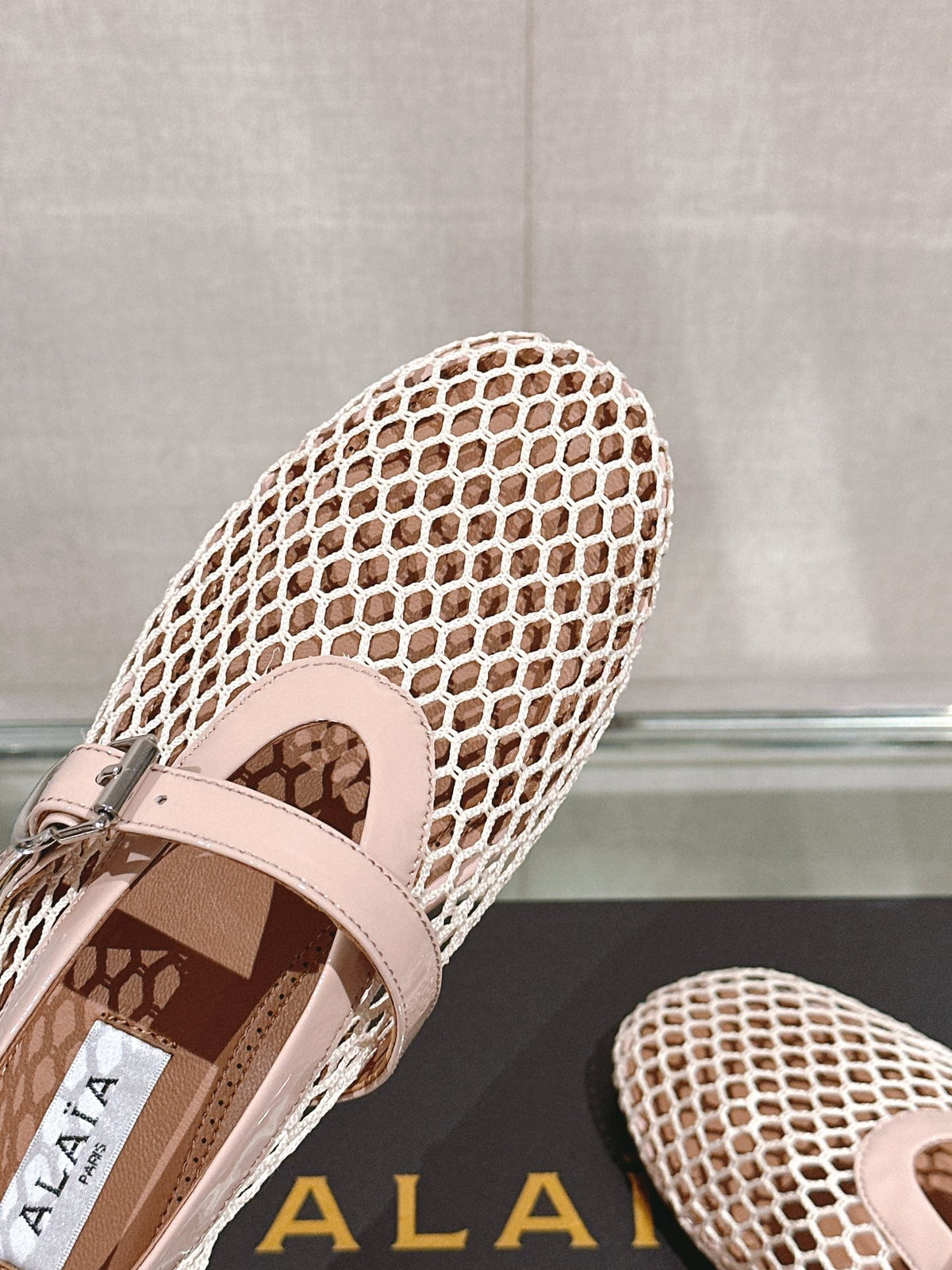 ALAIA BALLET FLATS IN NUDE BEIGE MESH