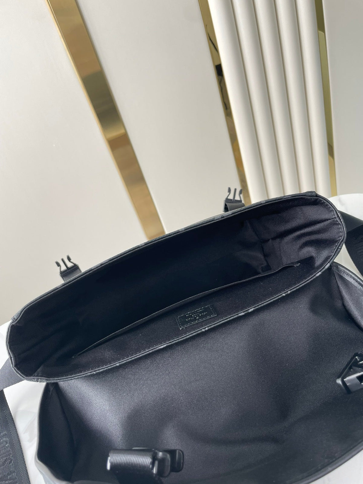 MESSENGER VOYAGER PM 33 IN GUN METAL MONOGRAM ECLIPSE CANVAS