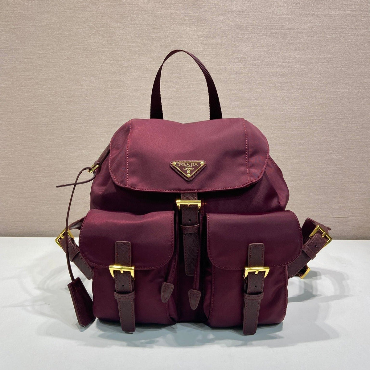 PRA backpack 28 burgundy nylon fabric gold hardware