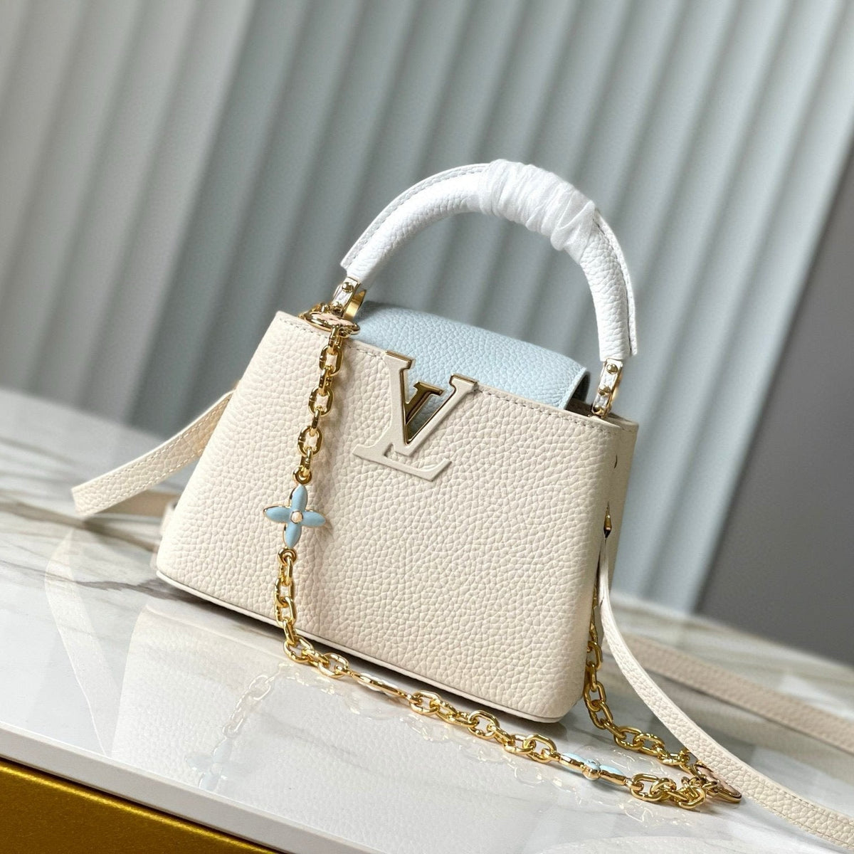 CAPUCINES MINI 21 CREAM CLOUD BLUE TAURILLON GOLD  HARDWARE