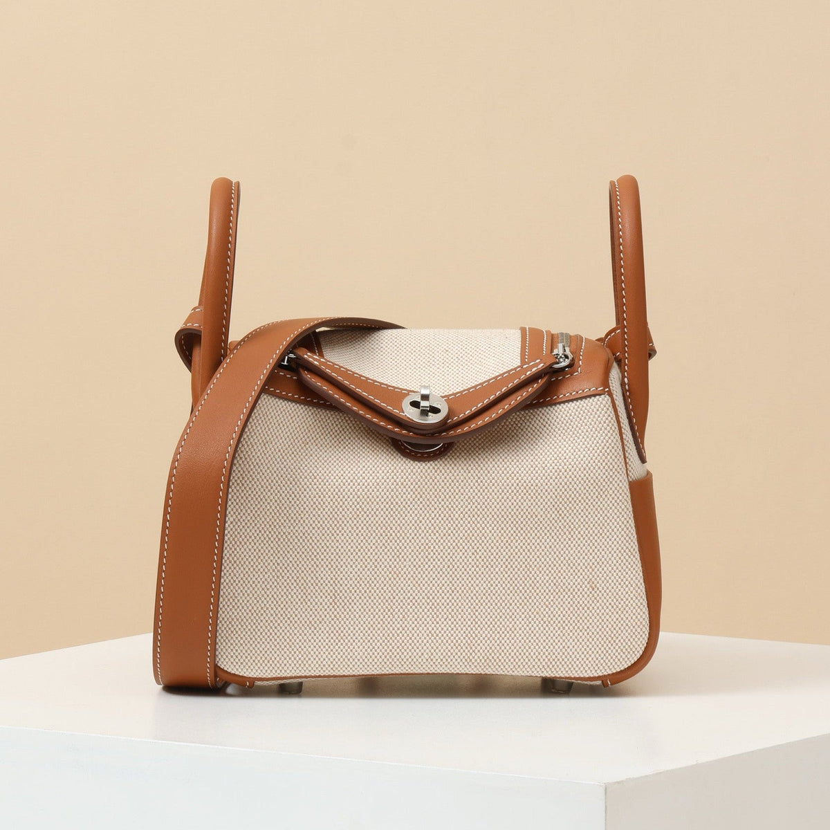 High-end Hermes 2026 Mini Lindy Cargo Bag 19cm Swift Leather Canvas