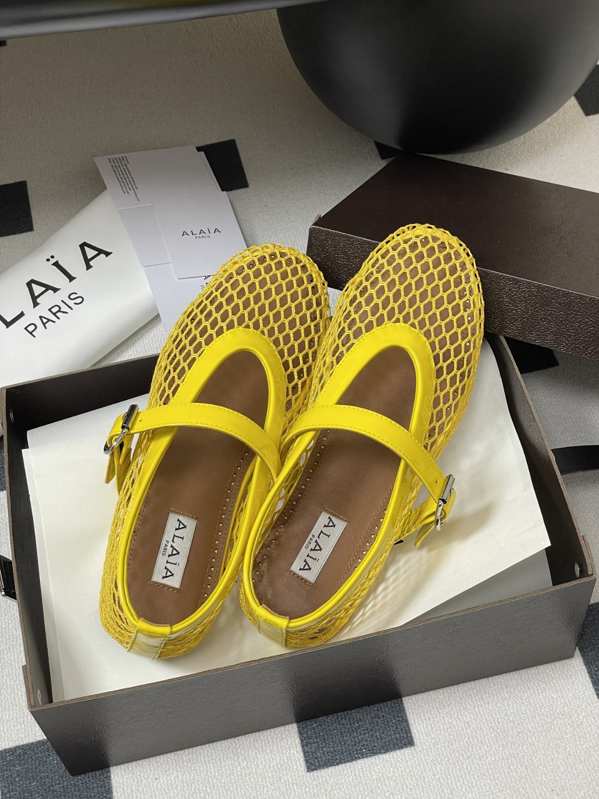 ALAIA BALLET FLATS IN YELLOW MESH FISHNET