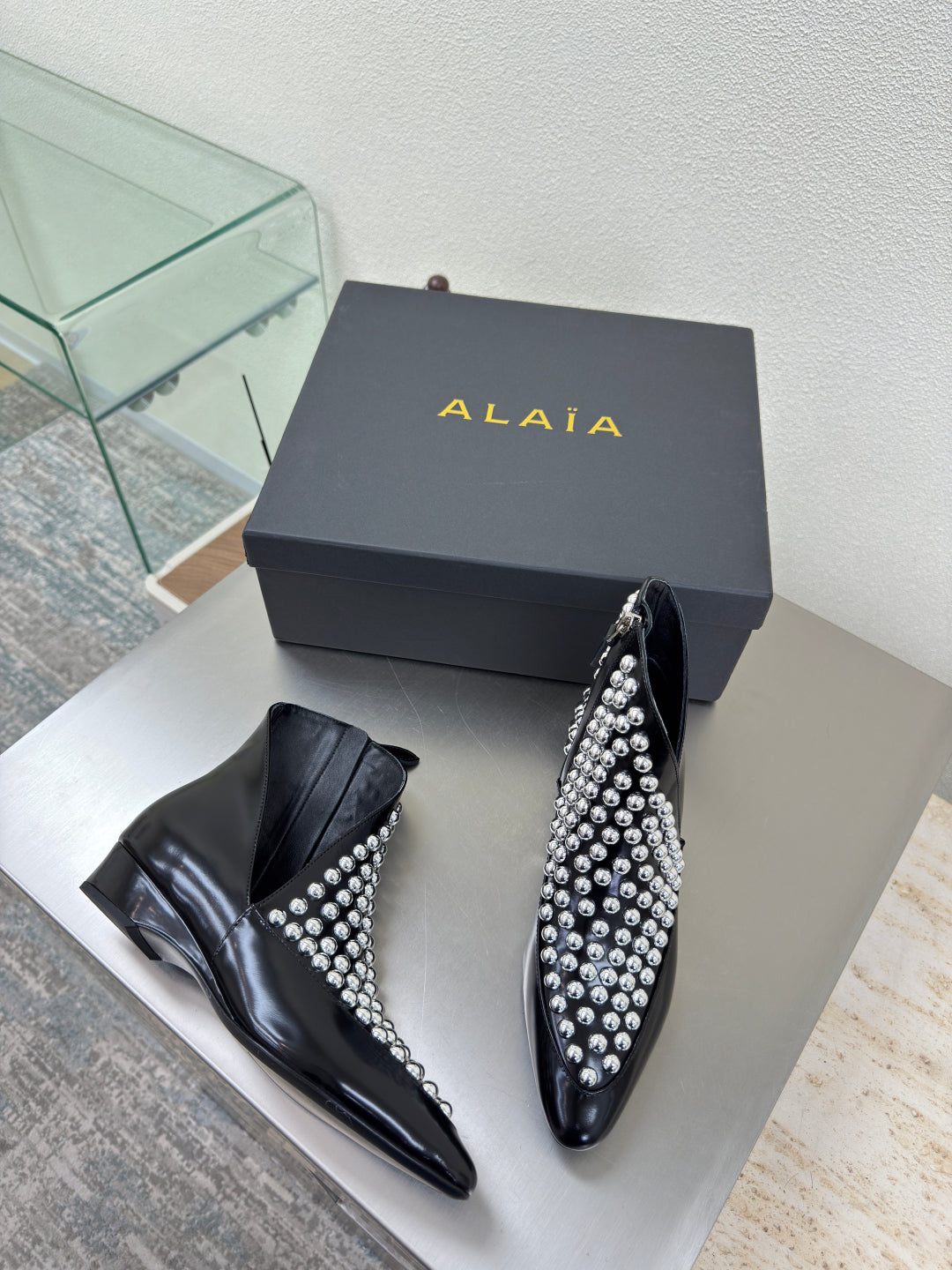ALAIA Rivet ankle boots black cowhide leather 471093
