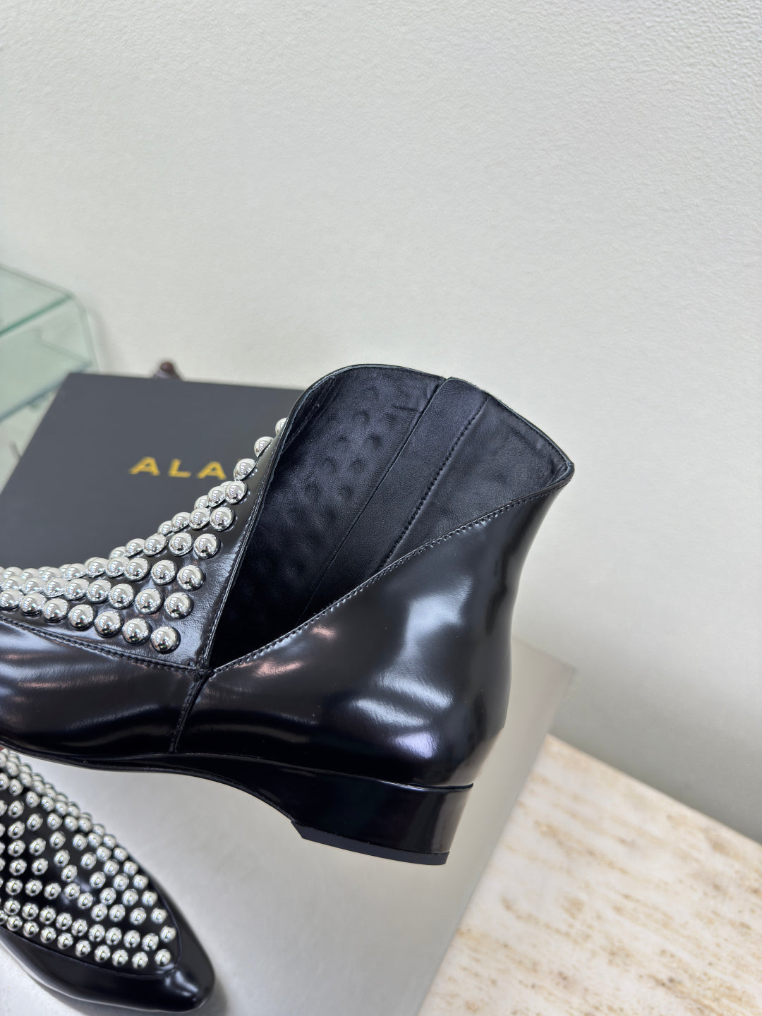 ALAIA Rivet ankle boots black cowhide leather 471093