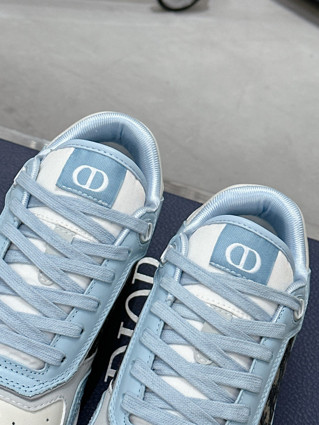 CD B27 Low-Top Sneaker 30mm In Could Blue Monogram Calfskin 100797