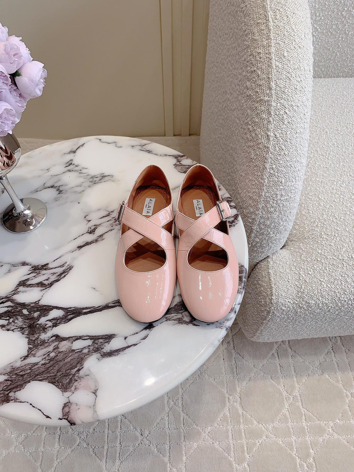 ALAIA CRISS CROSS BALLET FLAT IN BABY PINK LAMBSKIN WITH SILVER HARDWARE