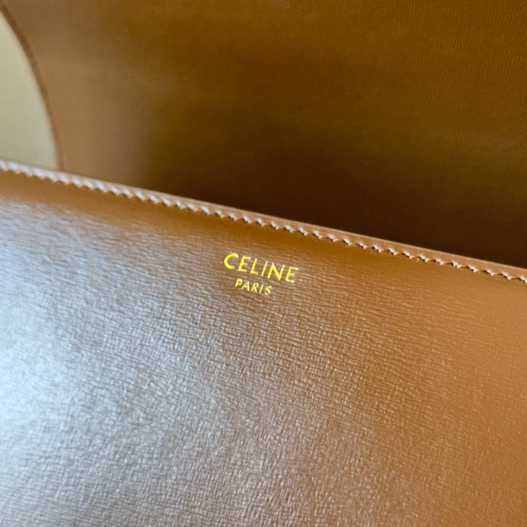 classique triomphe 22 dark brown calfskin gold hardware