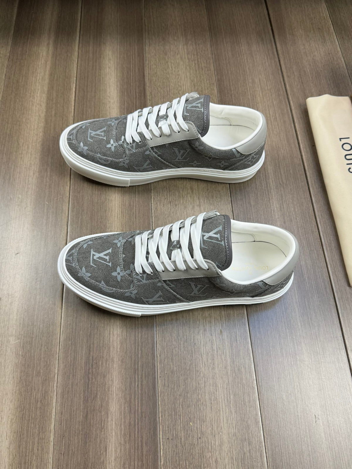 LV TRAINER SNEAKER IN GREY PASTEL MONOGRAM DENIM