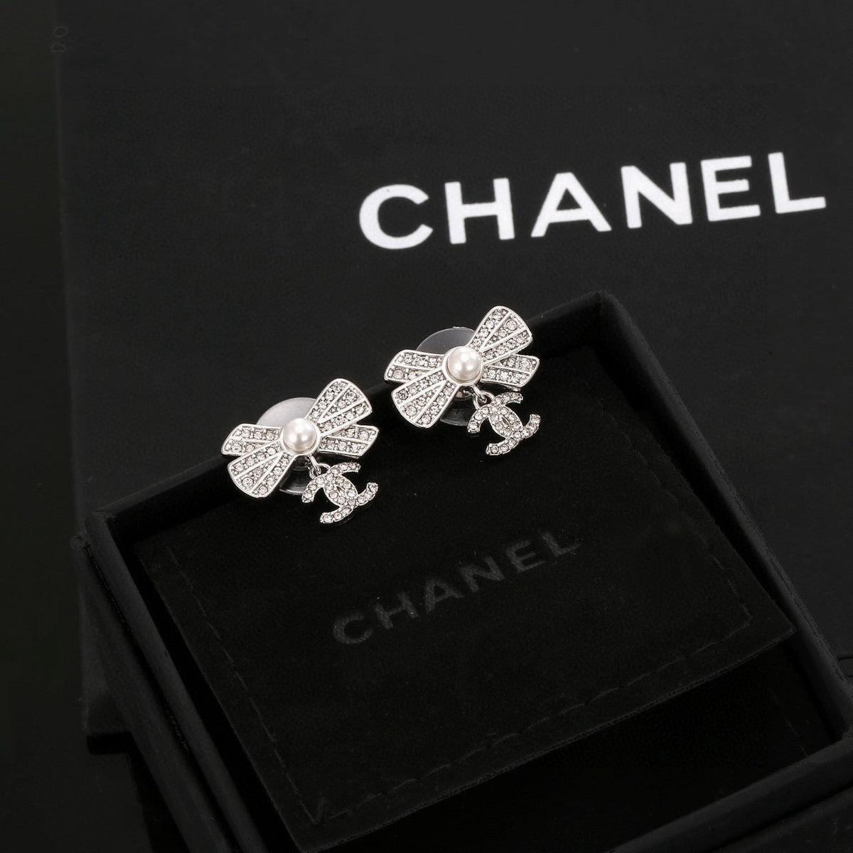 CC Double C Bow Sliver Diamond Pearl Earrings