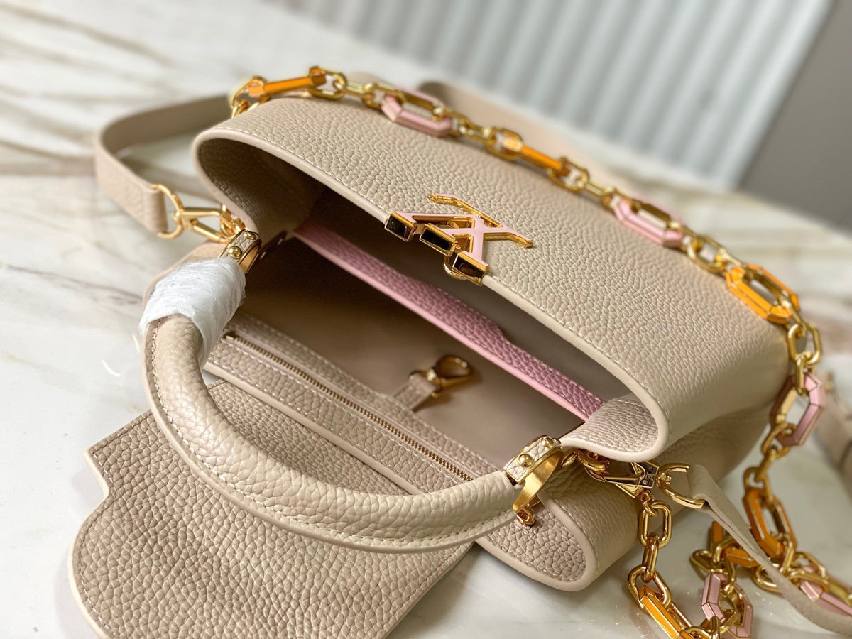 CAPUCINES BB 27CM BEIGE TAURILLON LEATHER