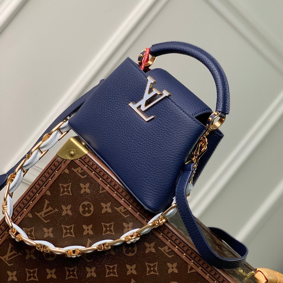 CAPUCINES MINI 21 DARK BLUE TAURILLON GOLD HARDWARE