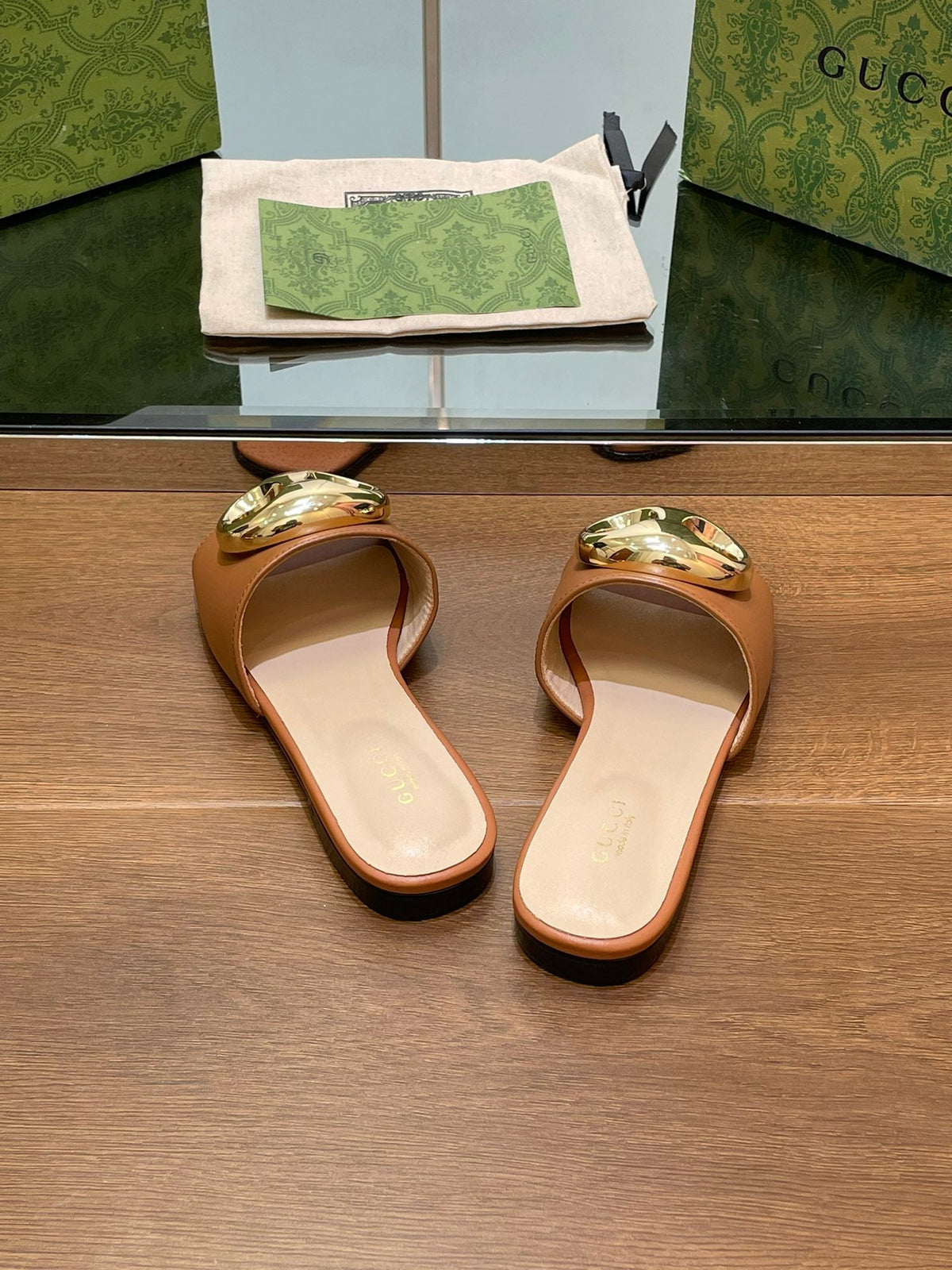 FLAT MULE IN BRONE BROWN CALFSKIN