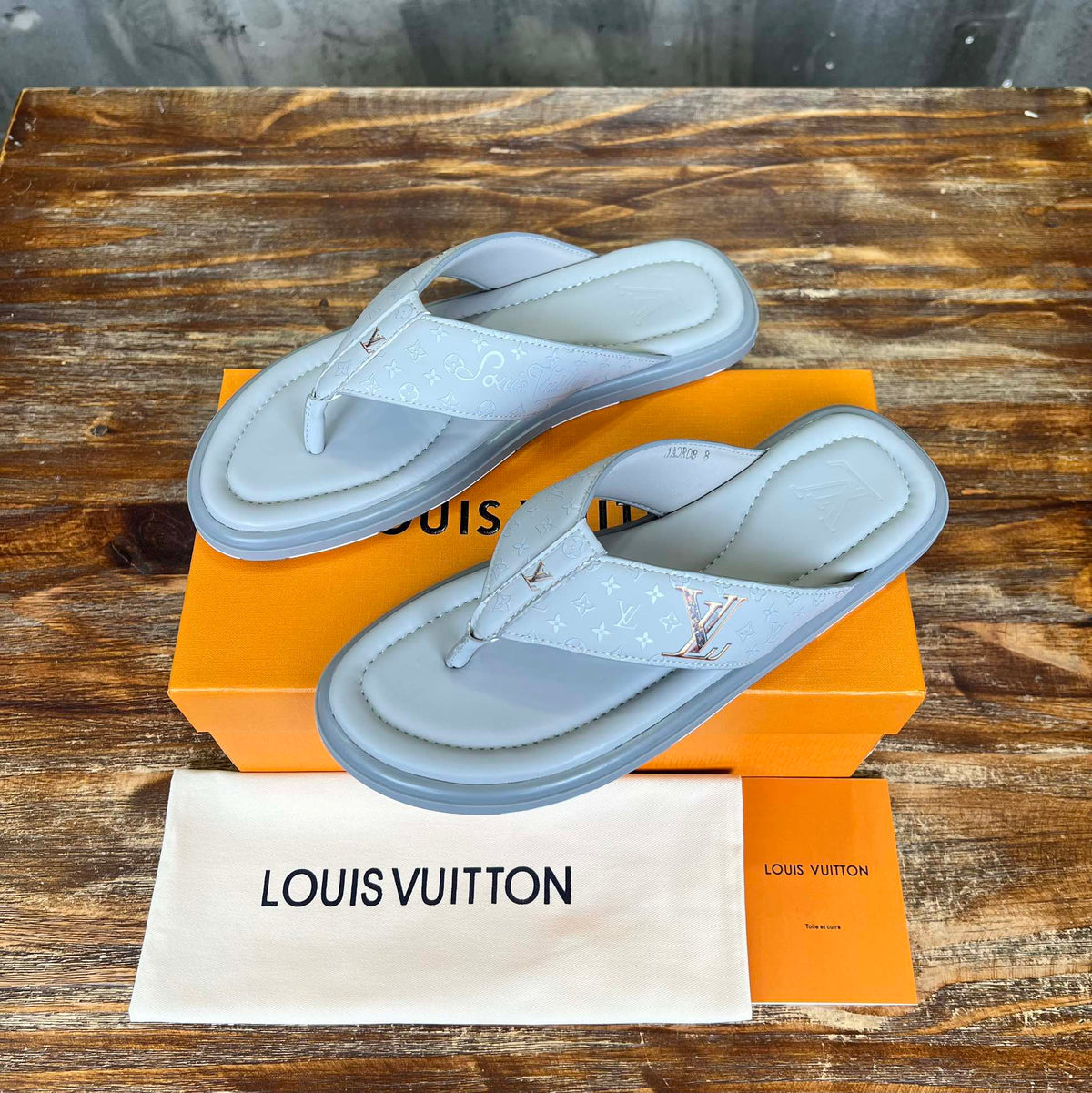 LV THONG SLIPPER IN GREY MONOGRAM CALFSKIN