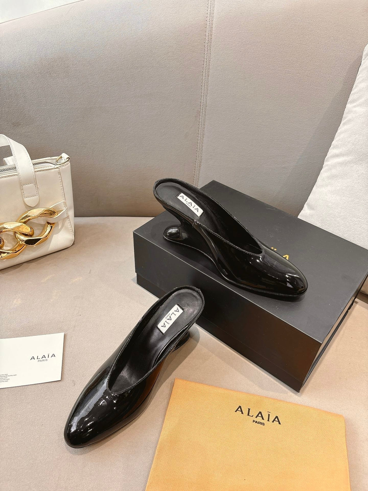 Alaia 25 Curve Wedge Mules Black Lambskin 293555