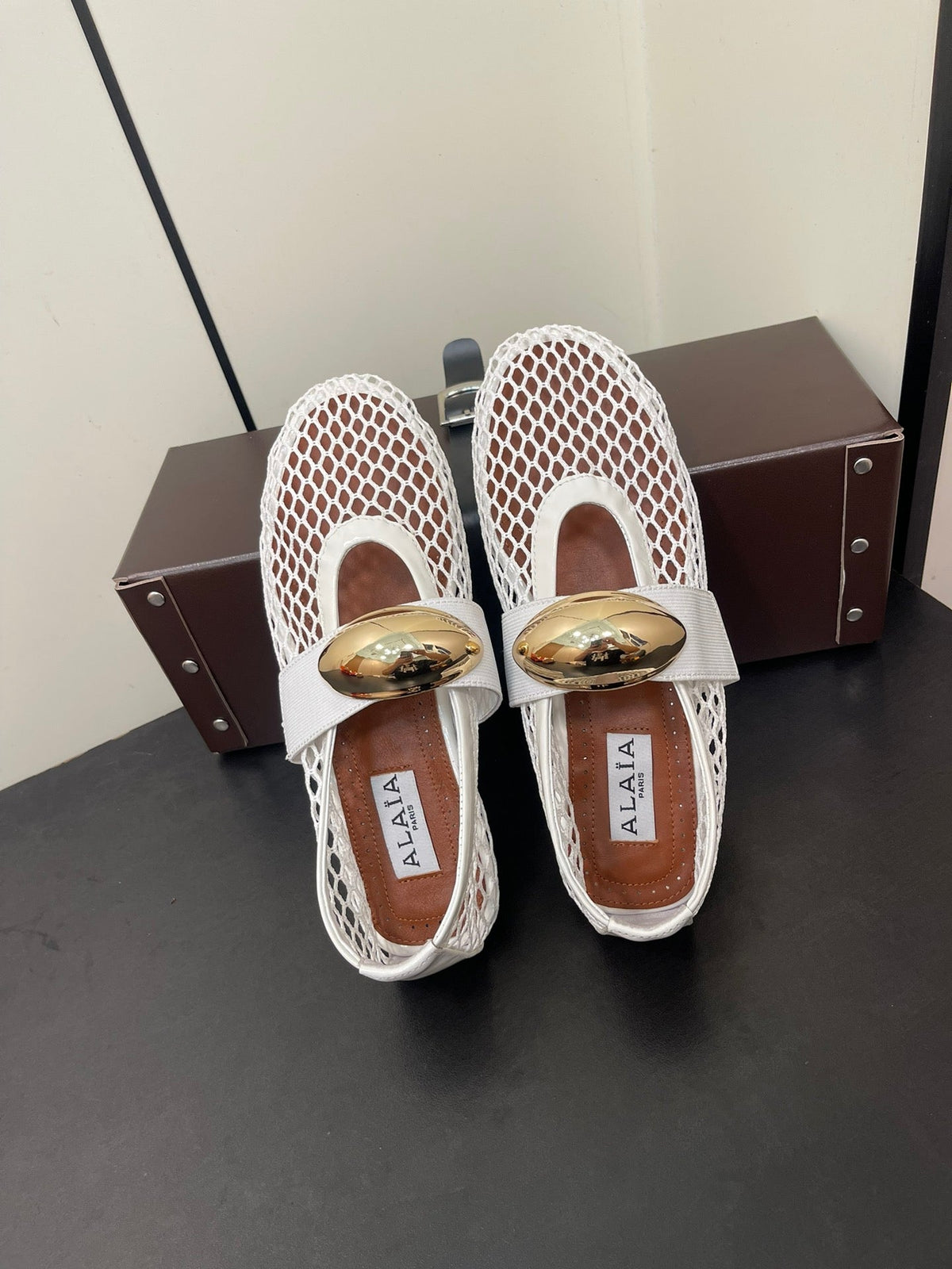 ALAIA BALLET FLATS IN WHITE MESH FISHNET WITH GOLD HARDWARE