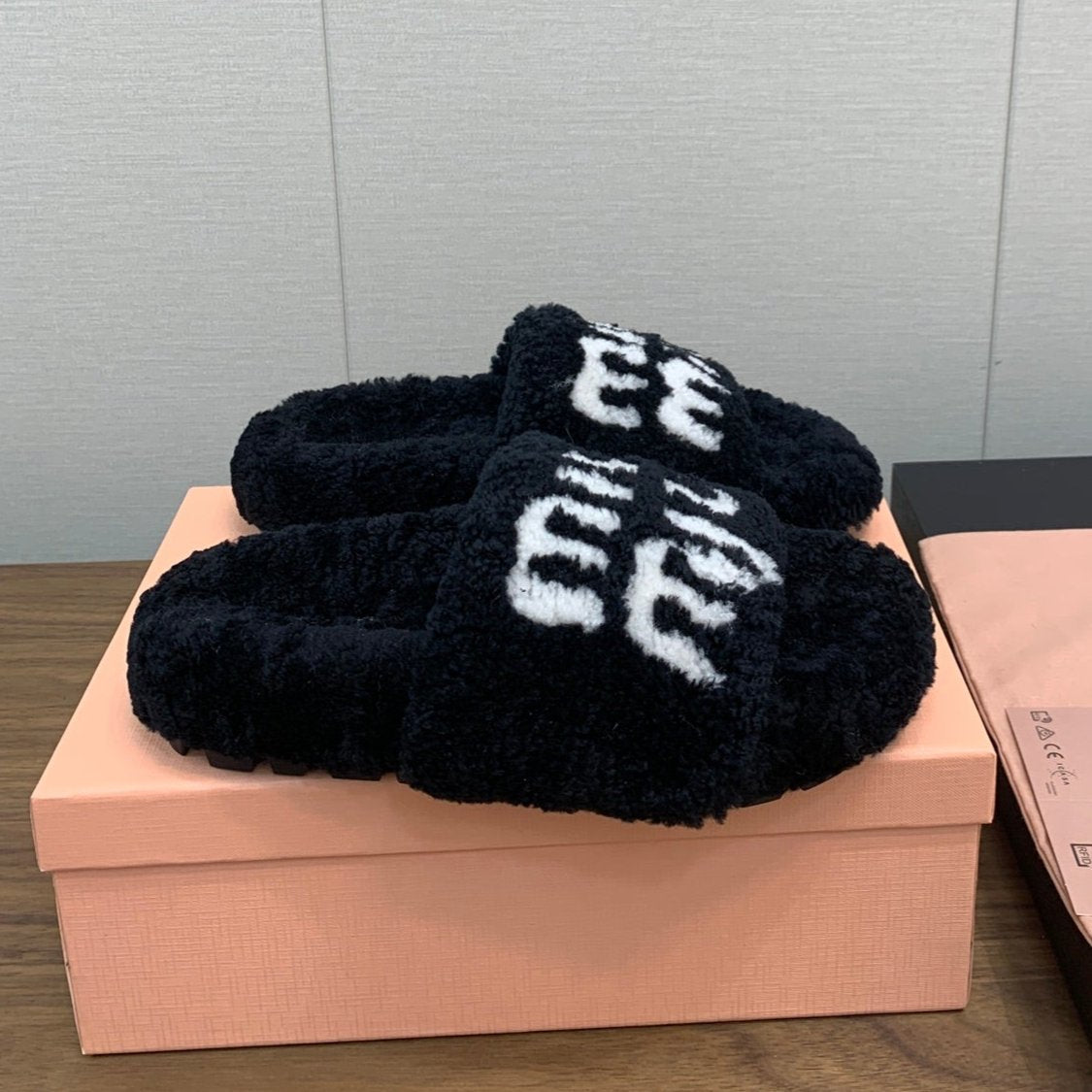 Miu slippers Black With White Text Pure Wool