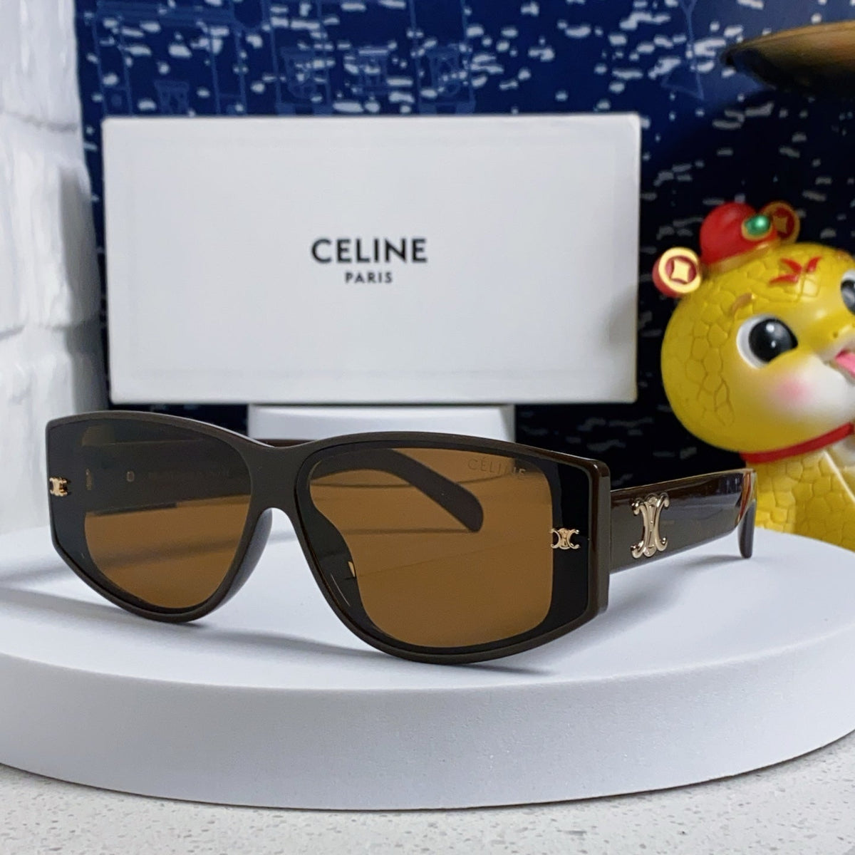 TRIOMPHE SUNGLASS 533219 IN CARAMEL ACETATE