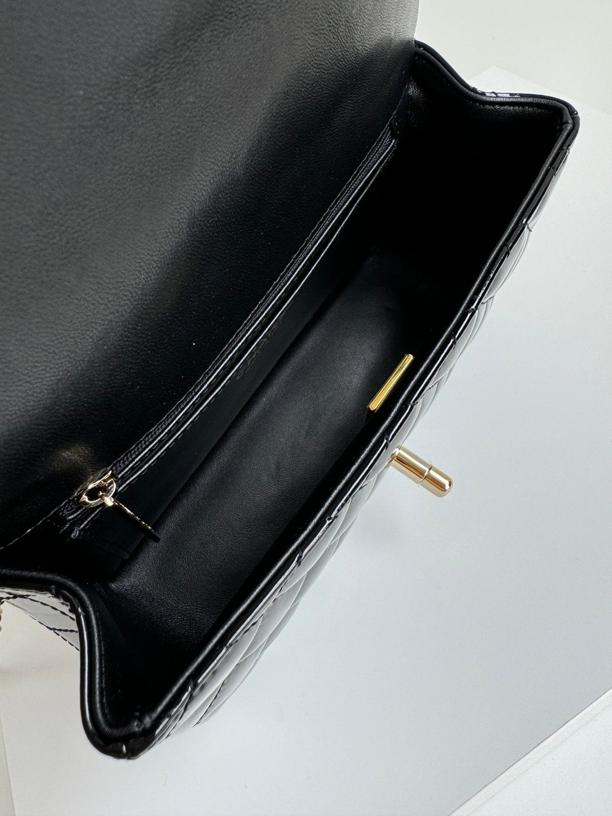 24c mini flap bag 20cm with top handle black patent calfskin
