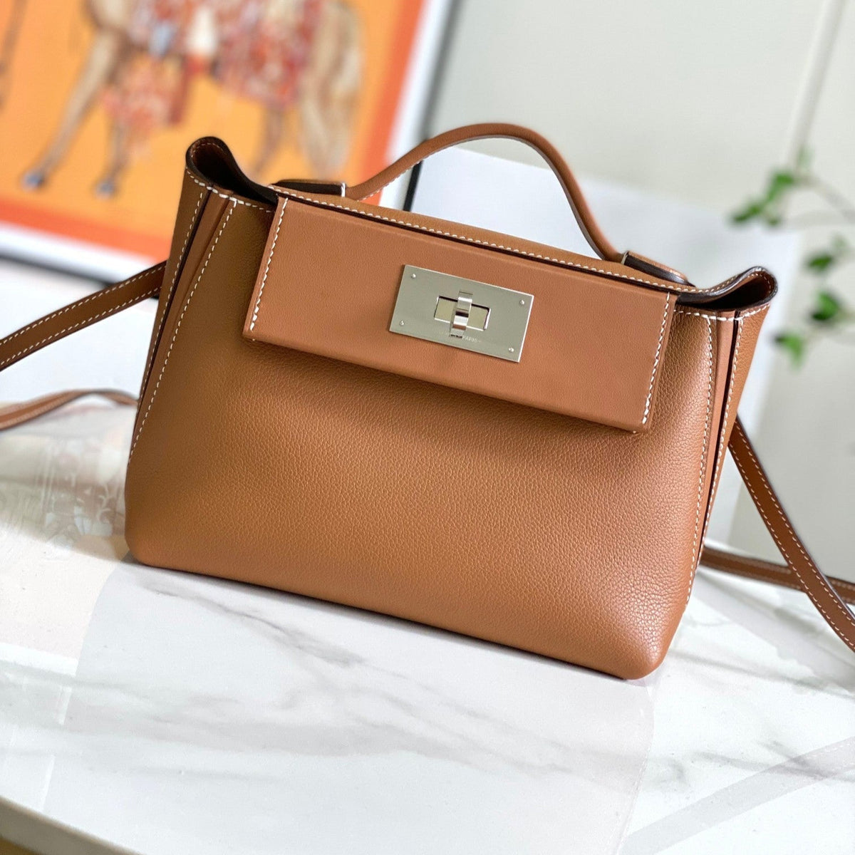 HM 24/24 Mini Bag 21cm Gold Evercolor Leather Silver Hardware