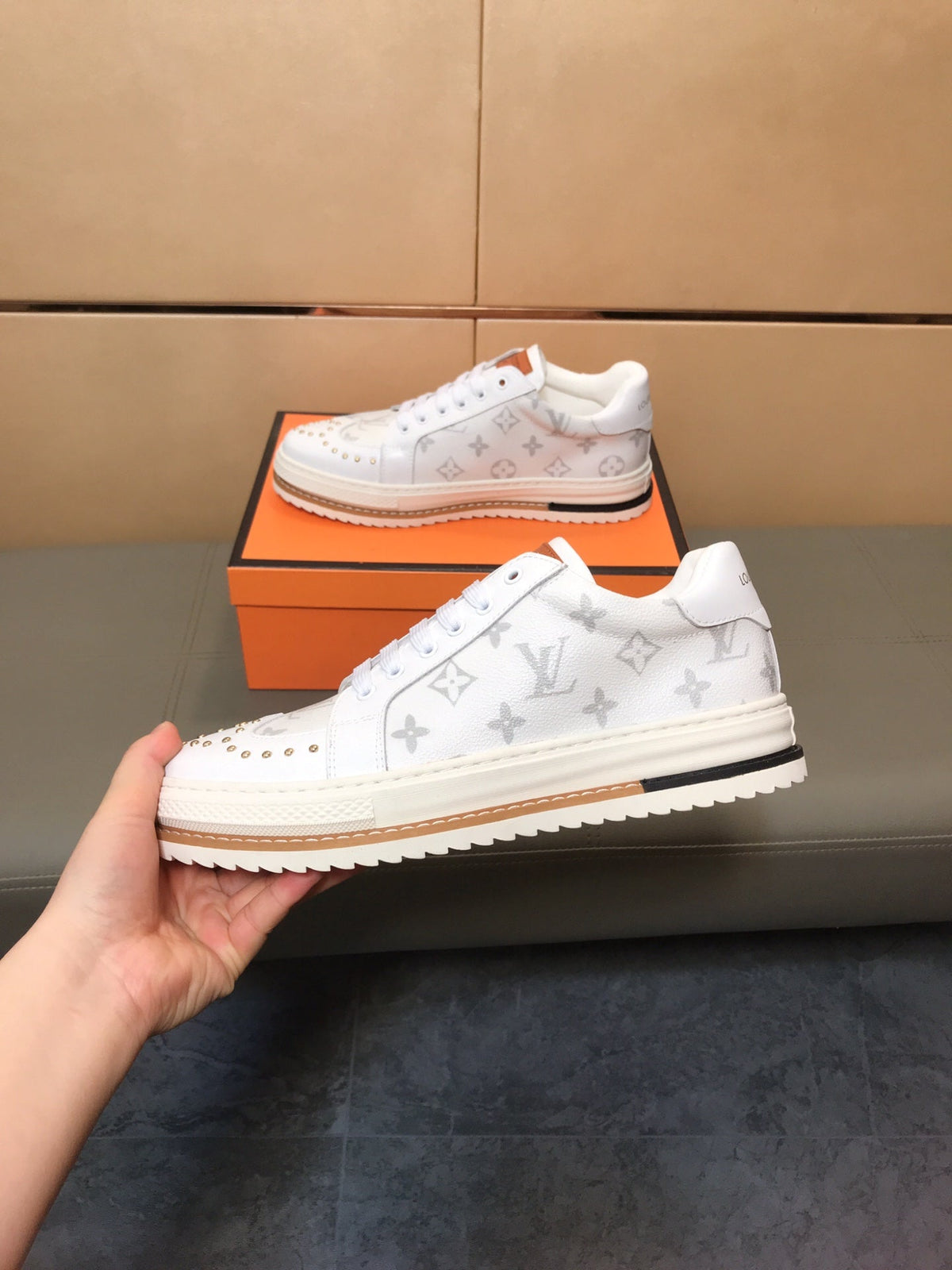 LV TRAINER IN WHITE MONOGRAM CALFSKIN