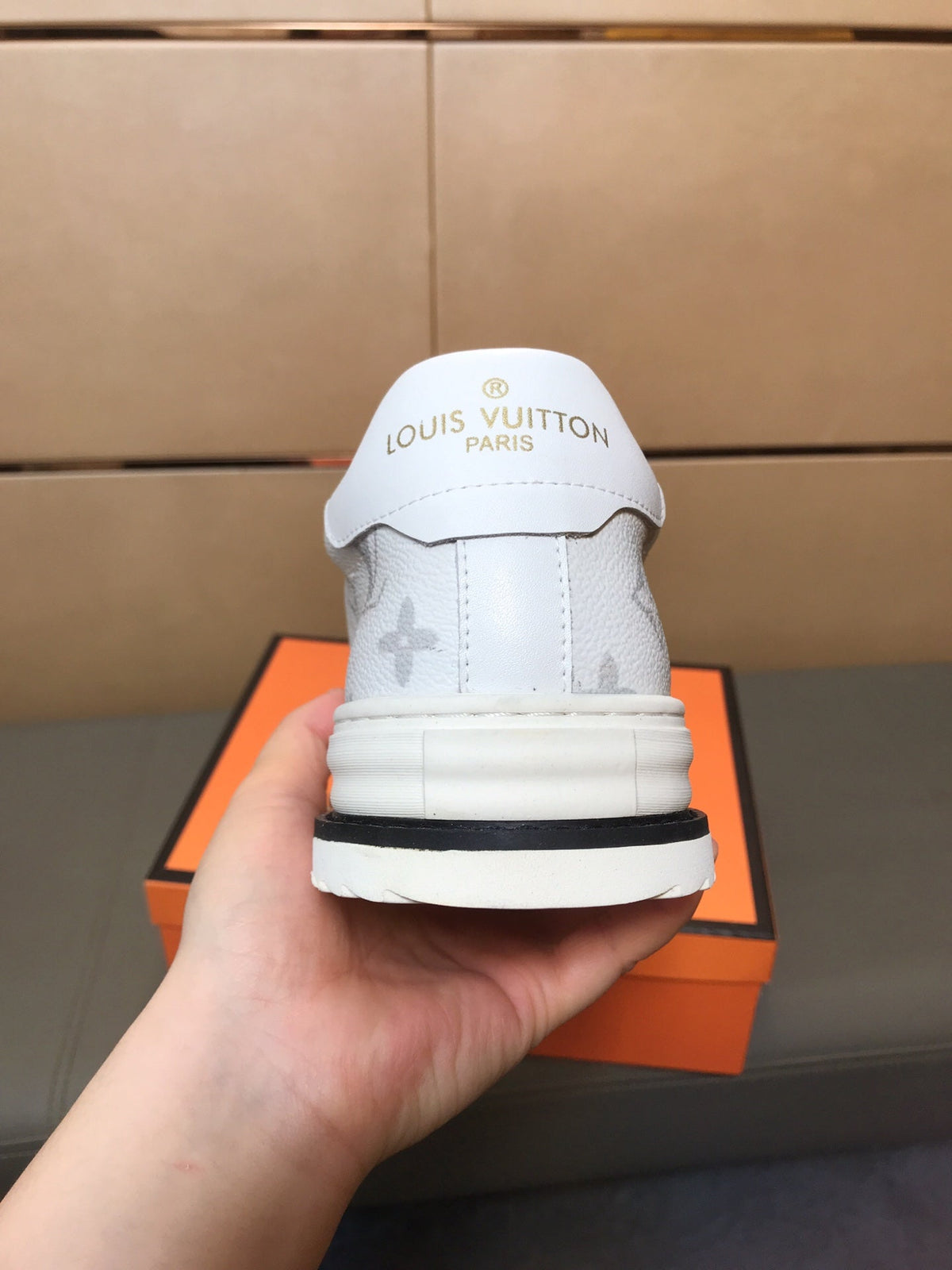 LV TRAINER IN WHITE MONOGRAM CALFSKIN