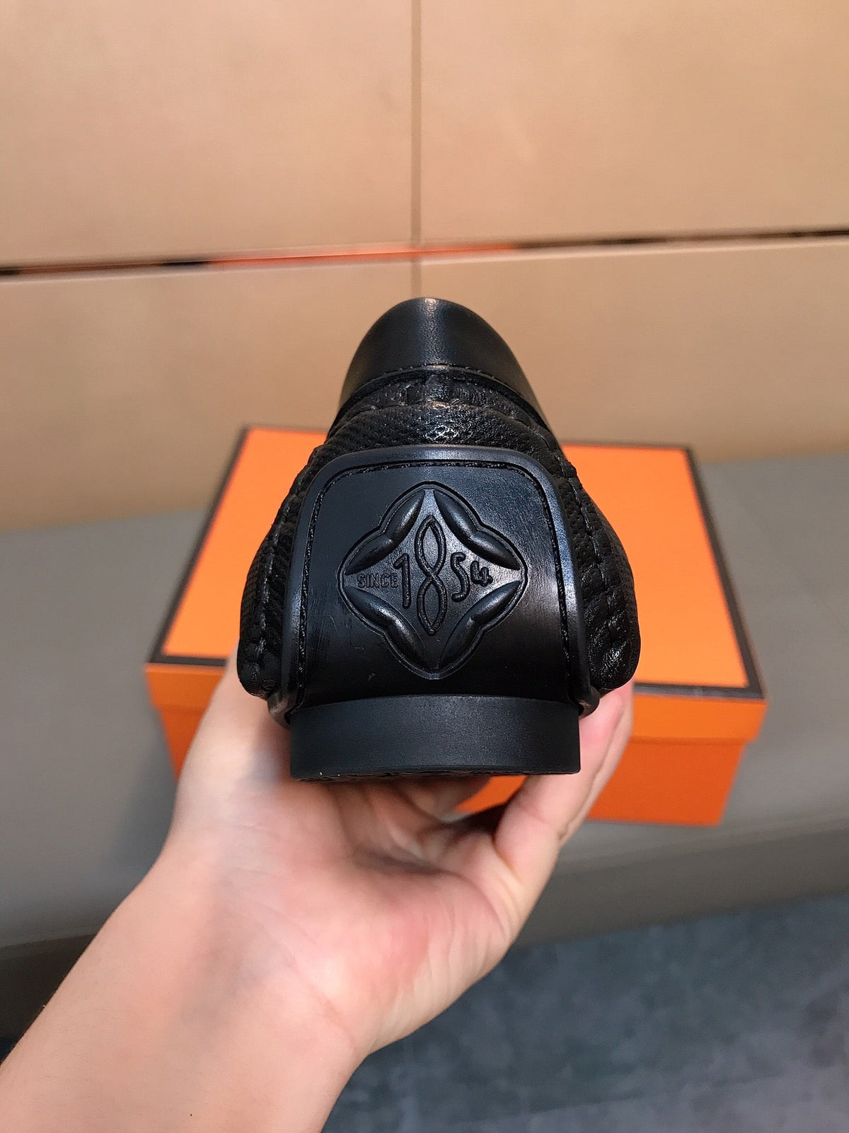 LV LOAFERS IN BLACK CALFSKIN WITH BRANDED EMBOSSING