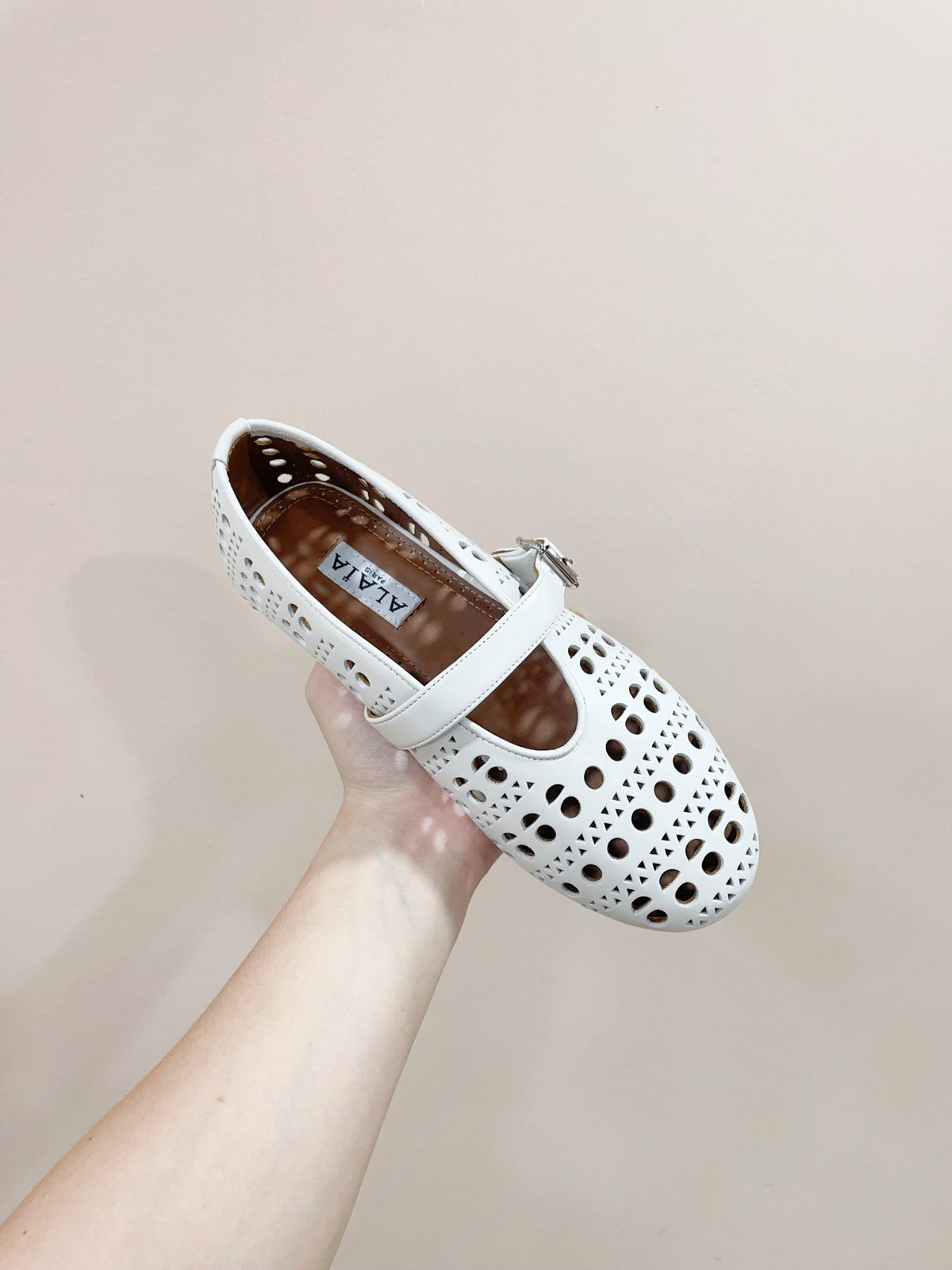 ALAIA HOLLOW BALLET FLAT IN WHITE LAMBSKIN