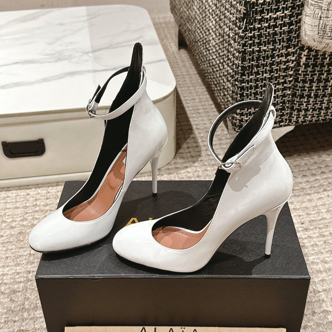ALAIA ROUND-TOE HIGH HEELS 10 CM IN WHITE CALFSKIN