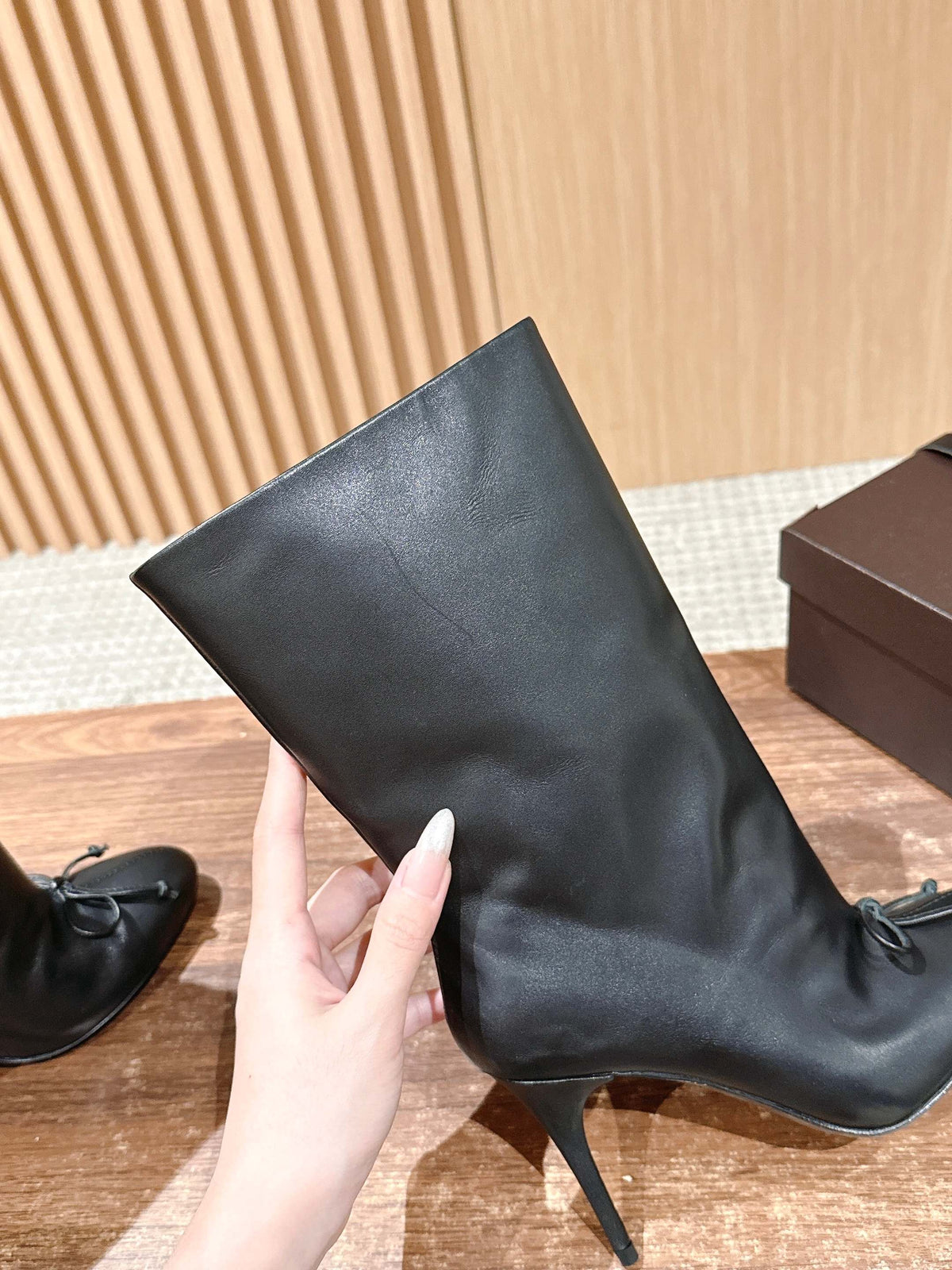 ALAIA high-heeled short boots black calfskin 386012