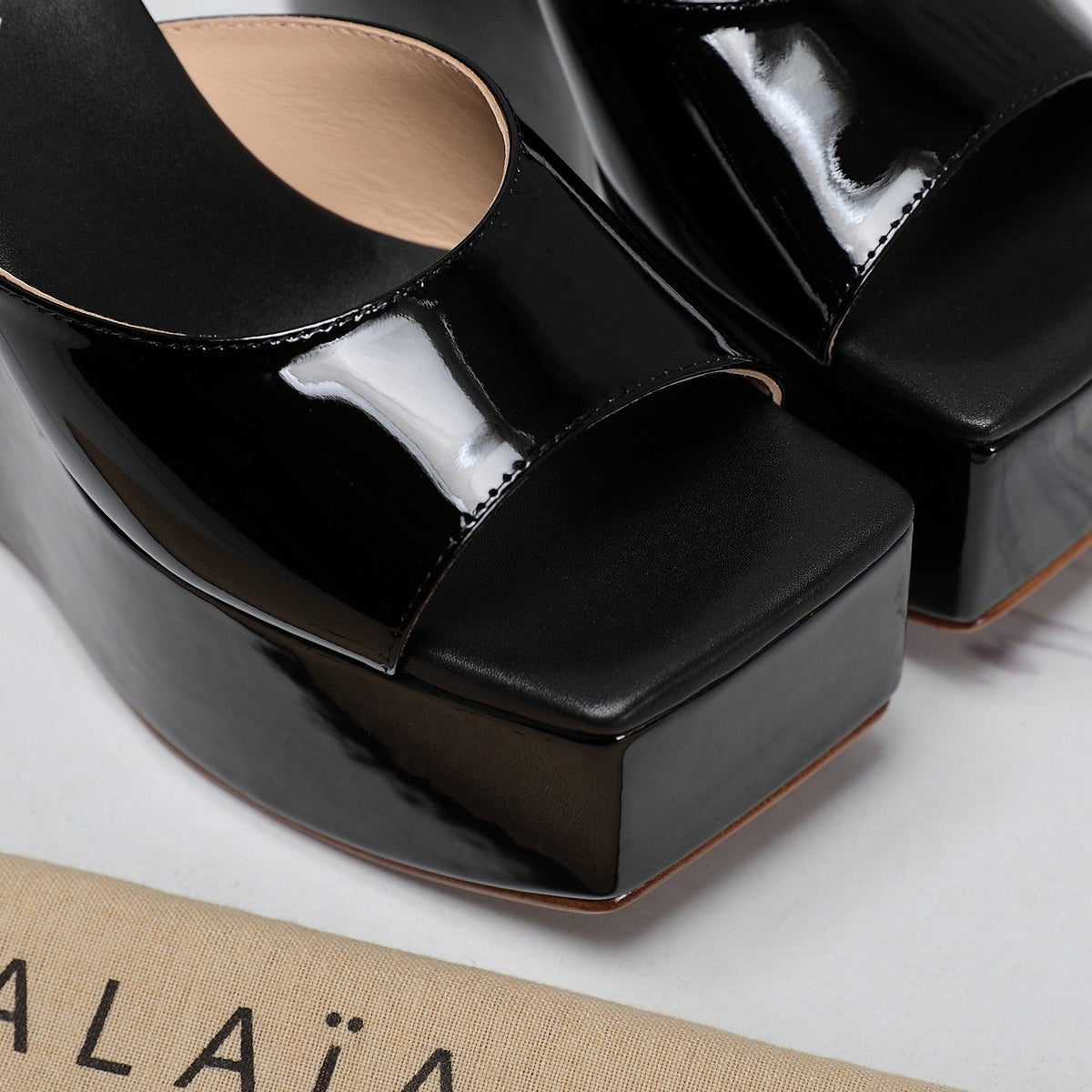 ALAIA PLATFORM WEDGE IN BLACK LAMBSKIN WITH RED HEART