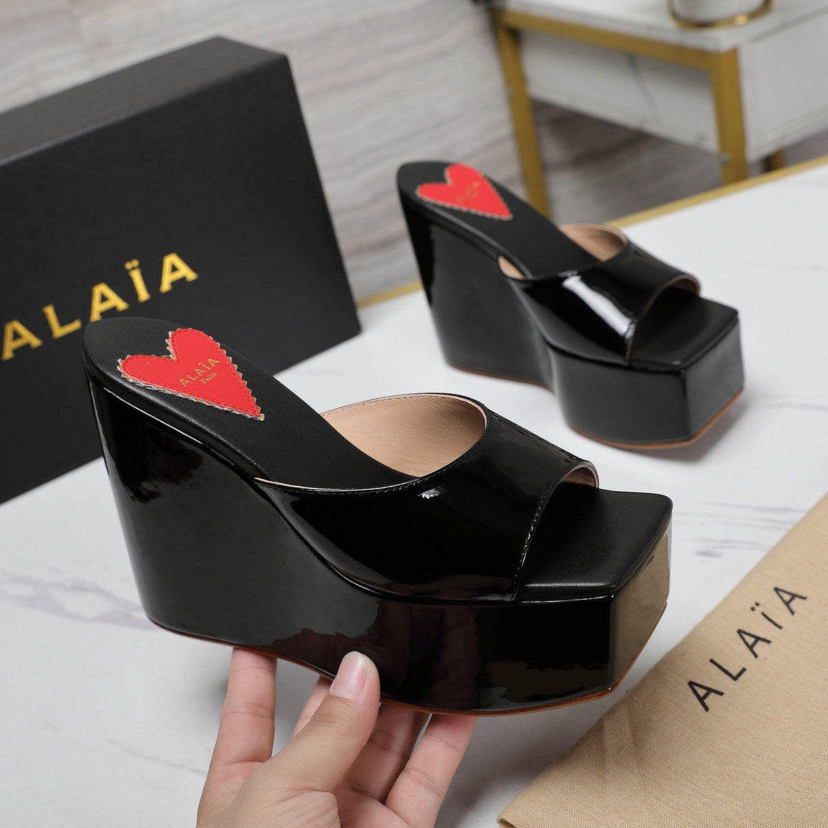 ALAIA PLATFORM WEDGE IN BLACK LAMBSKIN WITH RED HEART