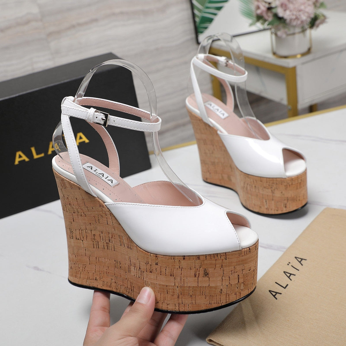 ALAIA WEDGE SANDAL IN WHITE GLOSSY CALFSKIN AND BEIGE RUBBER
