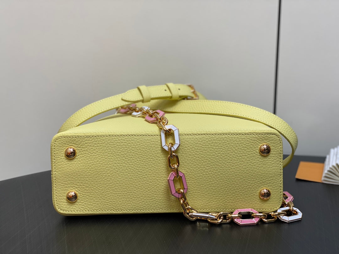 capucines mm 31.5 yellow taurillon leather gold hardware