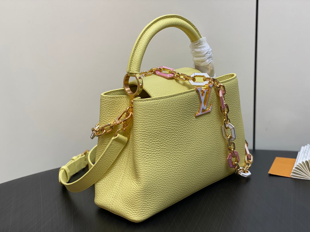 capucines mm 31.5 yellow taurillon leather gold hardware