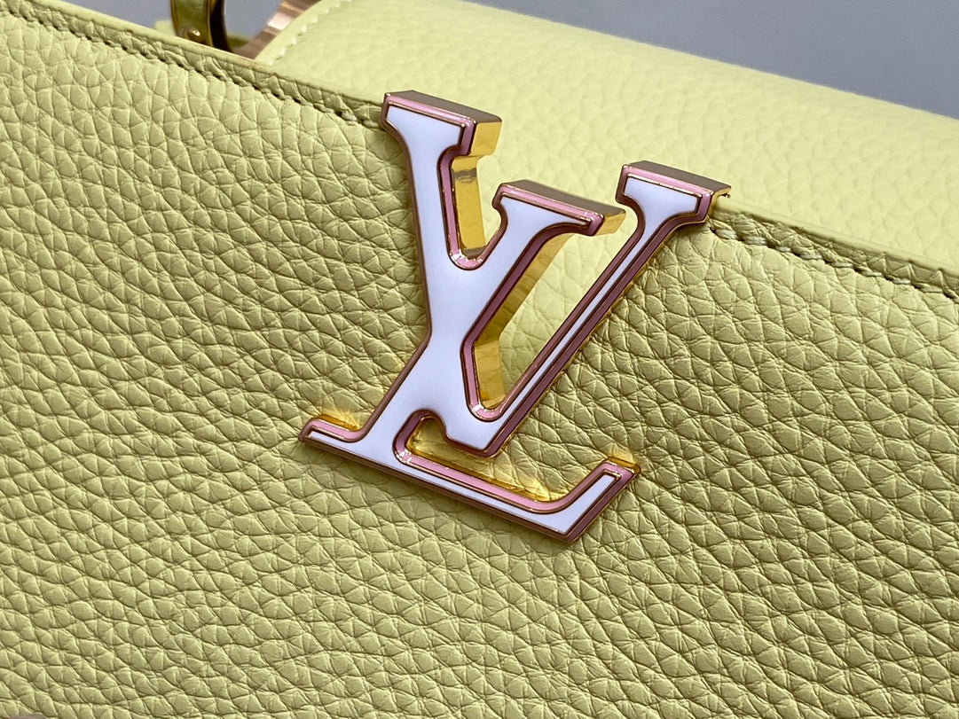 capucines mm 31.5 yellow taurillon leather gold hardware