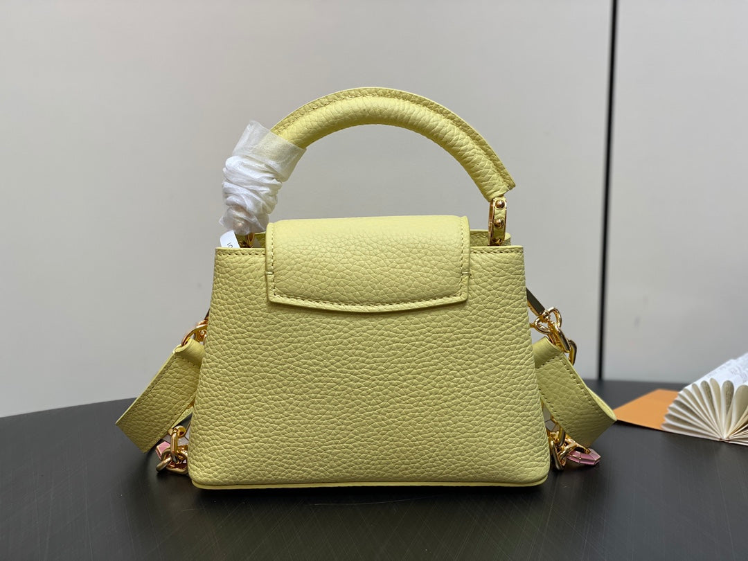 CAPUCINES MINI 21 YELLOW TAURILLON GOLD HARDWARE