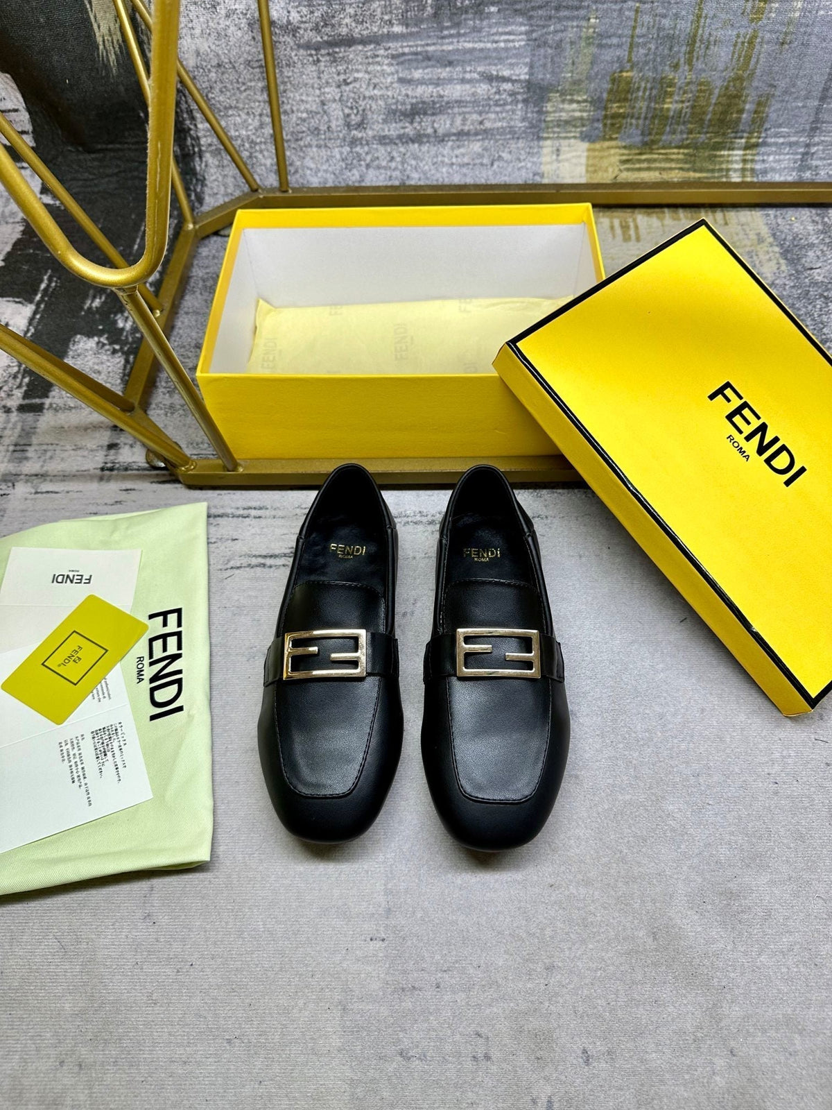 FENDI LOAFERS IN BLACK LAMBSKIN GOLD BUCKLE