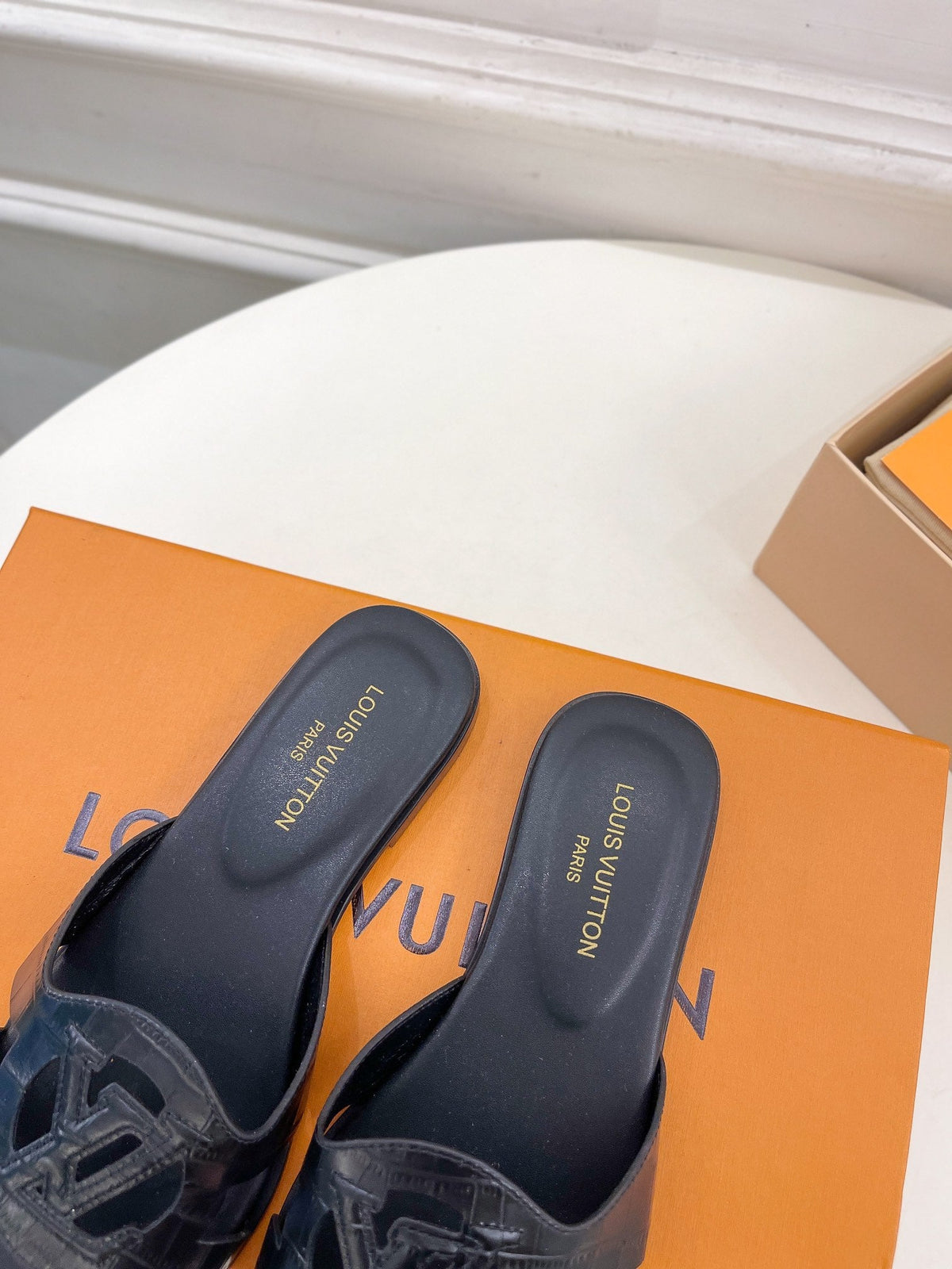 isola flat mule black calfskin