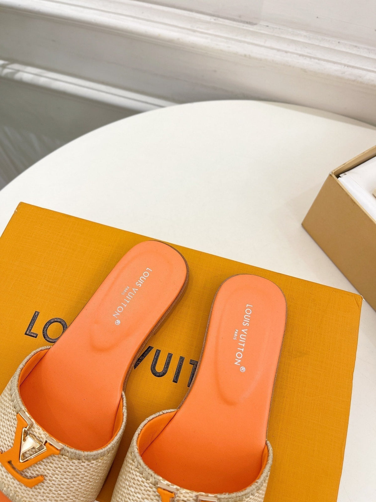 lv capri flat mule beige raffia orange calfskin