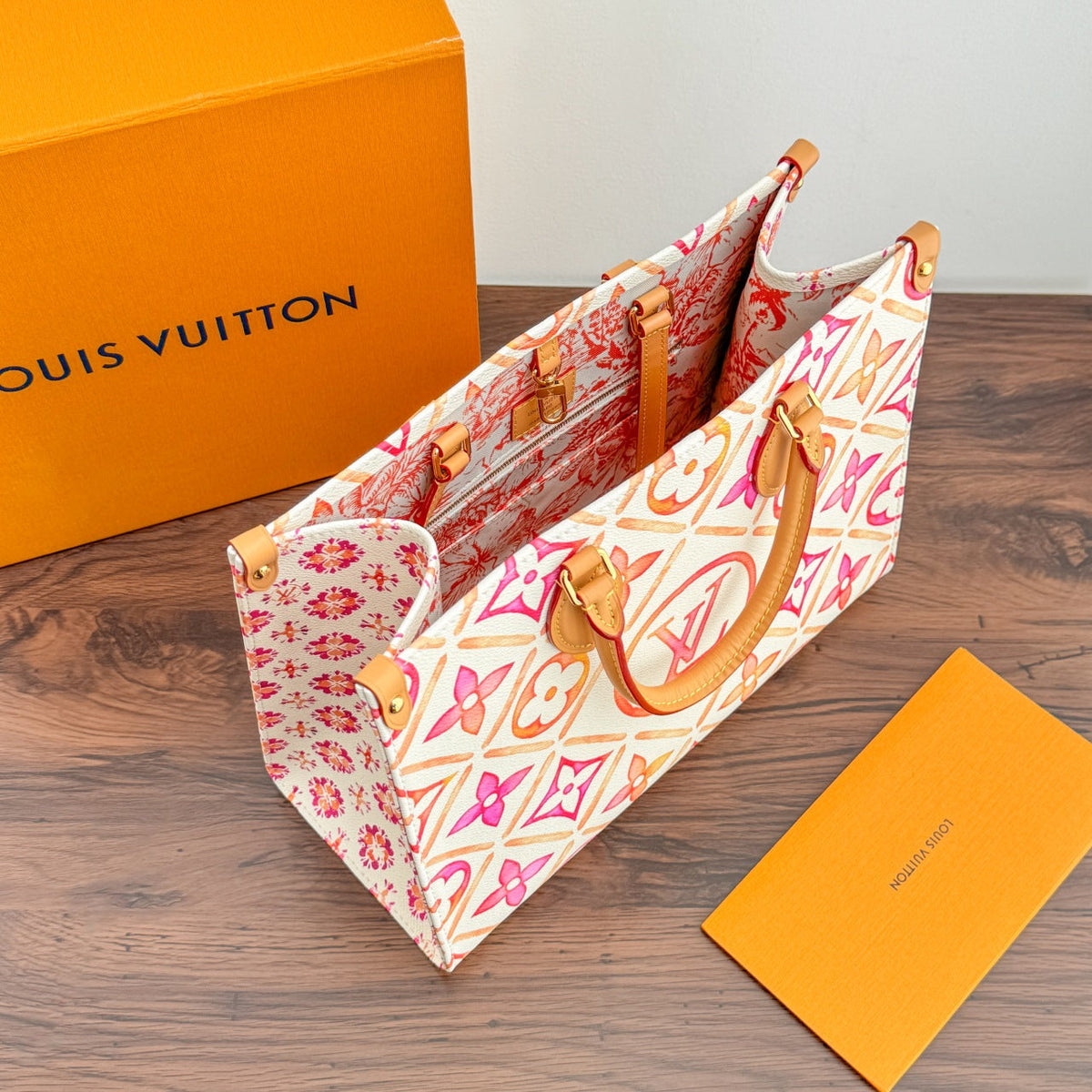ONTHEGO MM 35CM CORAL MONOGRAM CANVAS