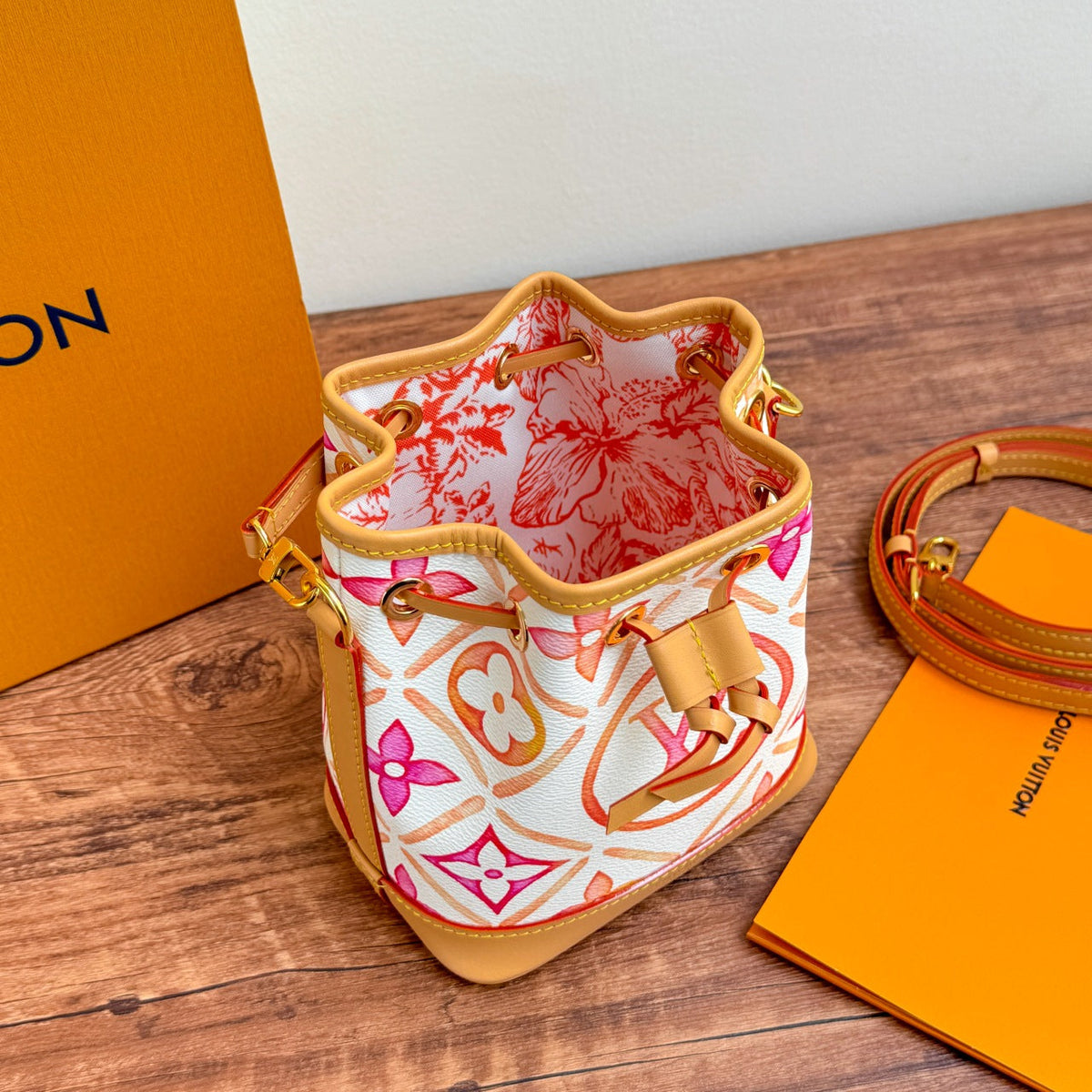 by the pool nano noe 13 coral monogram canvas