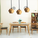 Wood Pendant light above the table 